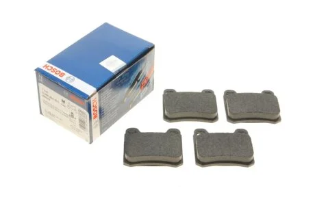 Колодки гальмівні (задні) MB C-class (W202/S202)/E-class (W124/S124/C124) 93-00/MB 100 (W201) 85-93 BOSCH 0986466871