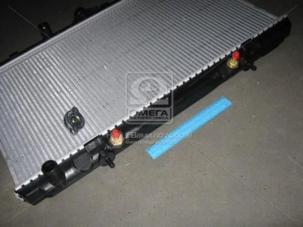 Радіатор NS ALMERA N16(00-)1.8 i 16V(+)[OE 21460-AV700] NISSENS 67345A