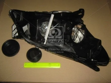 Фара левая с моторчиком Opel Astra H (07-) H1/H7 TYC 20-B208-05-2B