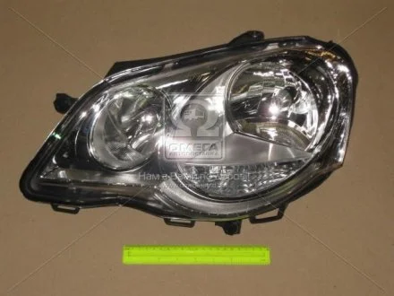 Фара ліва з моторчиком VW Polo (05-) H1/H7 TYC 20-A730-05-2B